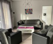 Wohnzimmer - Couch 1--villa-olga-grömitz